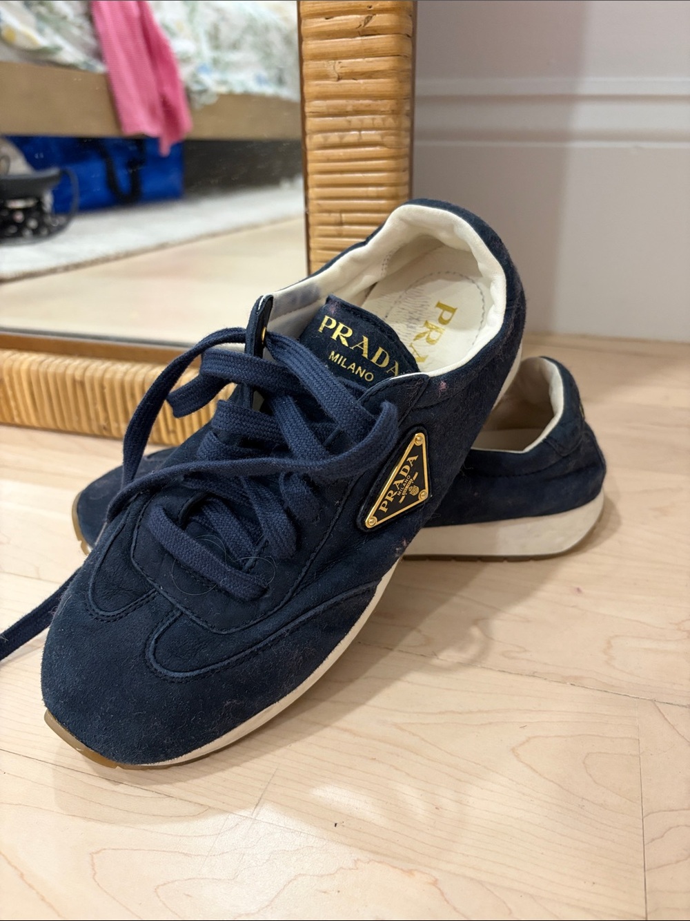 Prada Navy Suede Low-Top Sneakers with Gold Logo Plaque
